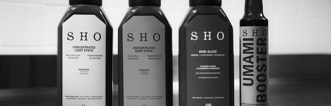 SHO product range including Concentrated Light Stock, Dark Stock, Demi-Glace and Umami Booster bottles