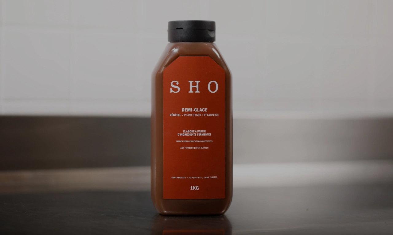 SHO Demi-Glace bottle labeled as a sauce base with technical file and ingredient information