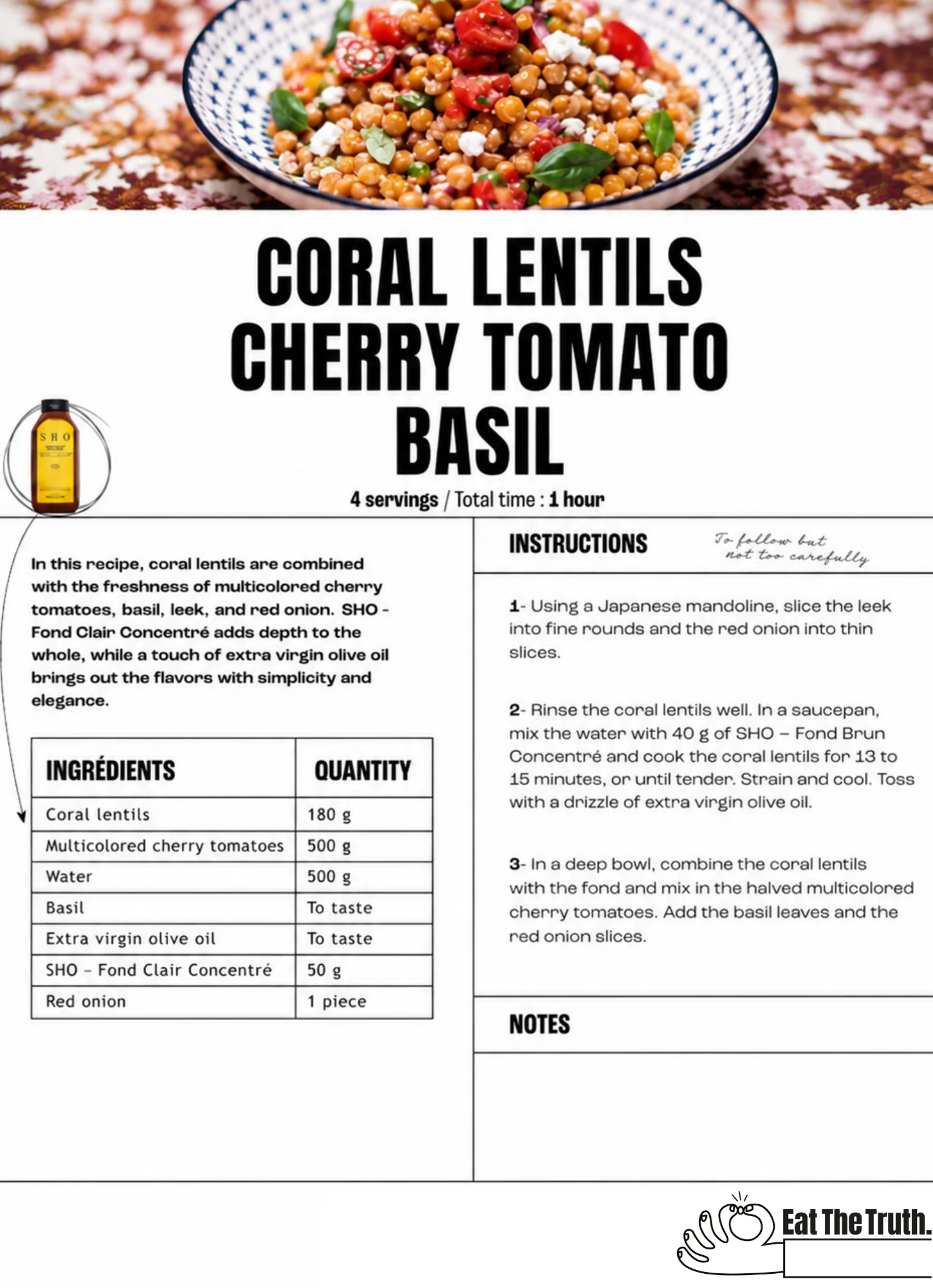 Coral lentil salad with multicolored cherry tomatoes, basil, and feta in a patterned bowl.